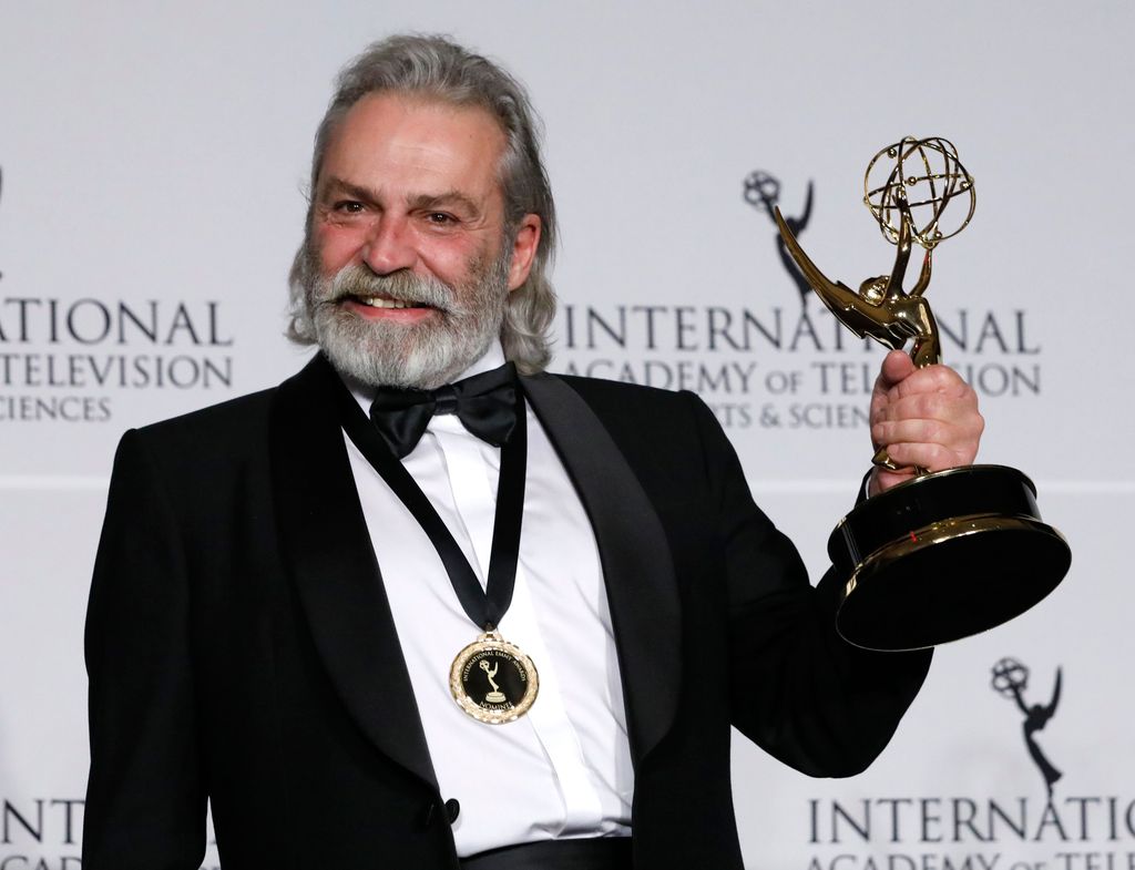 Haluk Bilginer holds the International Emmy for 'Sahsiyet' in the category of Performance by an Actor at the 47th International Emmy Awards Gala at the New York Hilton hotel in New York, USA, 25 November 2019