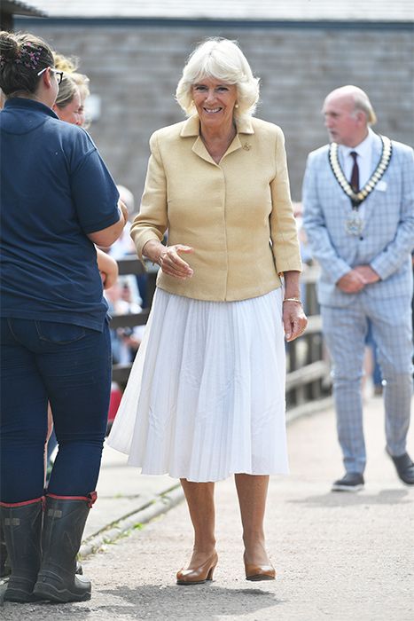 camilla parker bowles outfit yellow jacket white skirt
