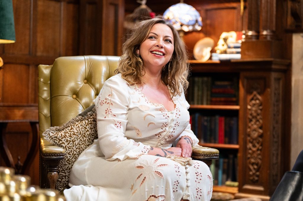 Charlotte Church sitting in an armchair on the set of Celebrity Traitors