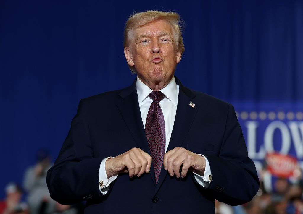U.S. President Donald Trump takes the stage during a rally at the Rocky Mount Event Center on December 19, 2025