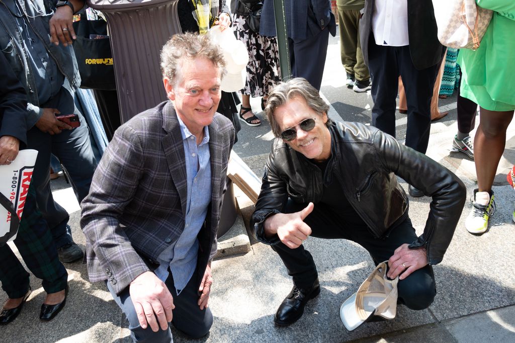 Michael Bacon and Kevin Bacon pose by their plaque at the 2023 Philadelphia Music Alliance Walk Of Fame Plaque Unveilings outside of University of the Arts on South Broad Street on April 20, 2023 in Philadelphia, Pennsylvania