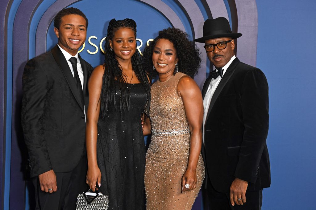 Slater Josiah Vance, Bronwyn Golden Vance, US actress and Honorary Award recipient Angela Bassett and Courtney B. Vance arrive at the 14th Annual Governors Awards in 2024