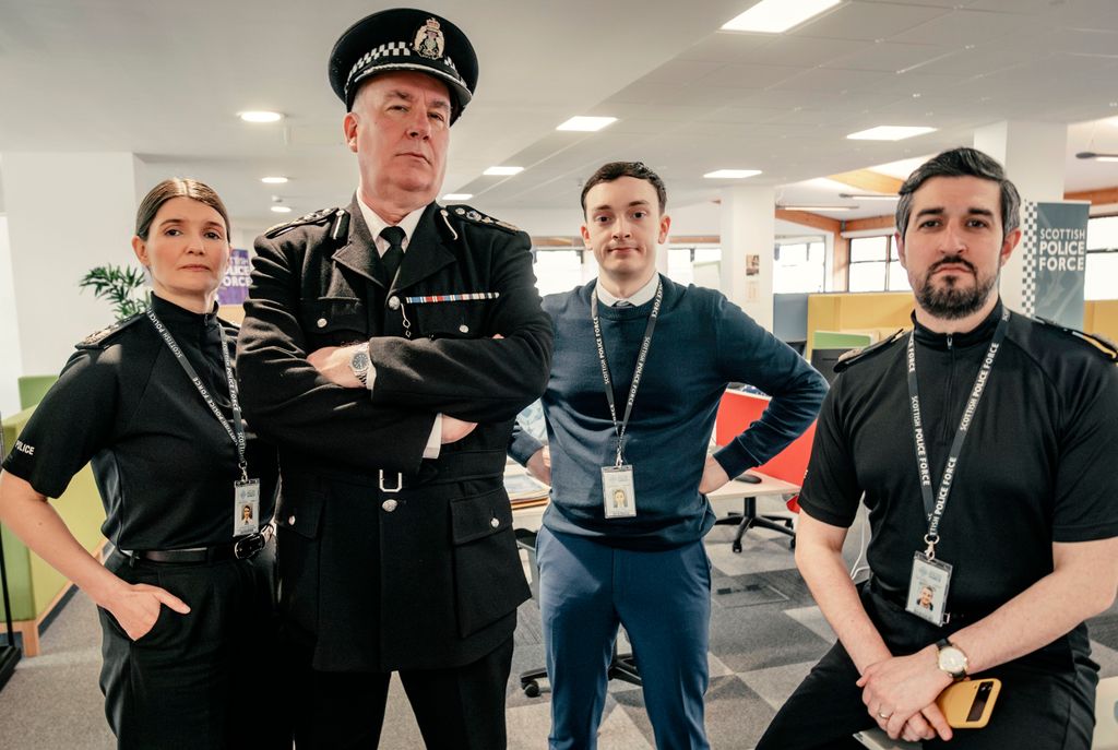 group of police officers standing in office