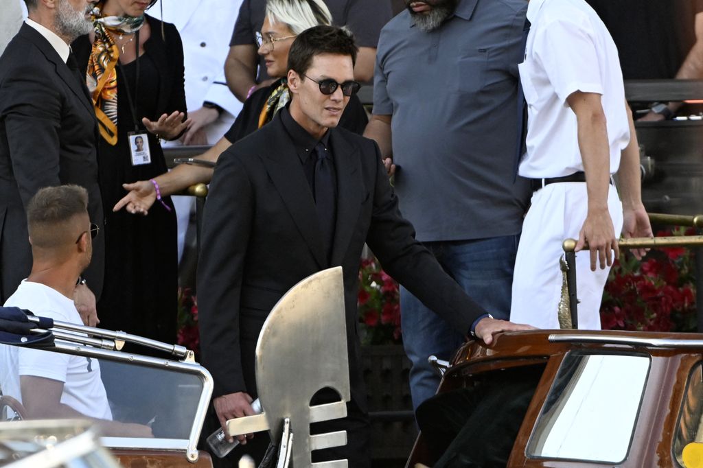 Tom Brady leaves the Gritti Palace Hotel on the wedding day of Amazon founder Jeff Bezos with Lauren Sanchez