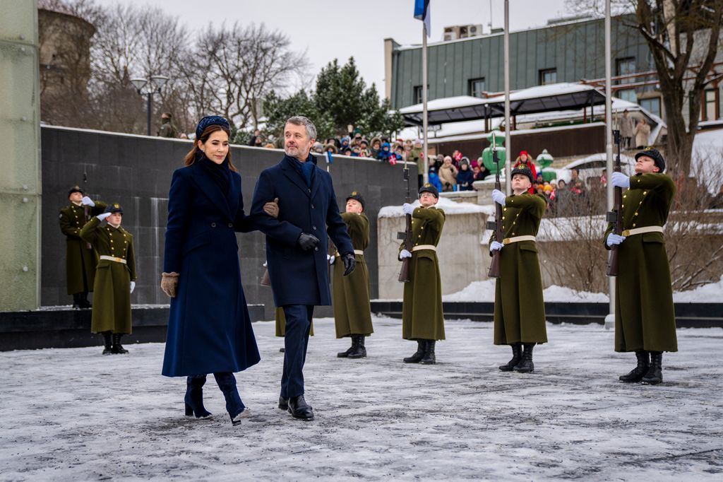King Frederik X and Queen Mary participate in a wreath-laying ceremony at the War of Independence Monument in Tallinn in coats