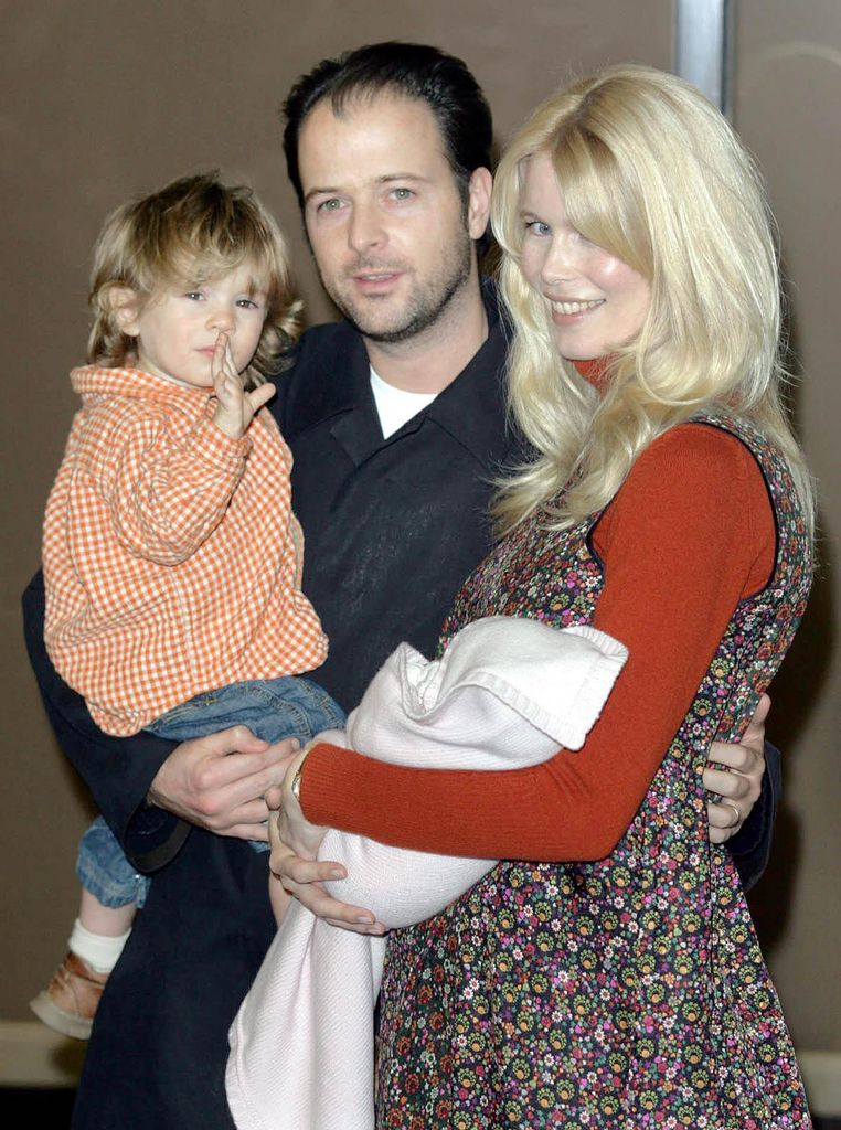 Claudia with her husband Matthew Vaughn, new baby Clementine and son Casper, 2004