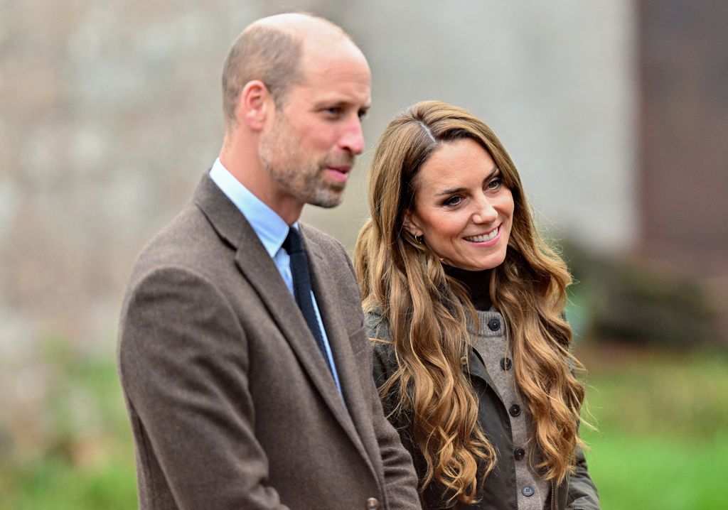 Prince William and Princess of Wales side on outside in jackets