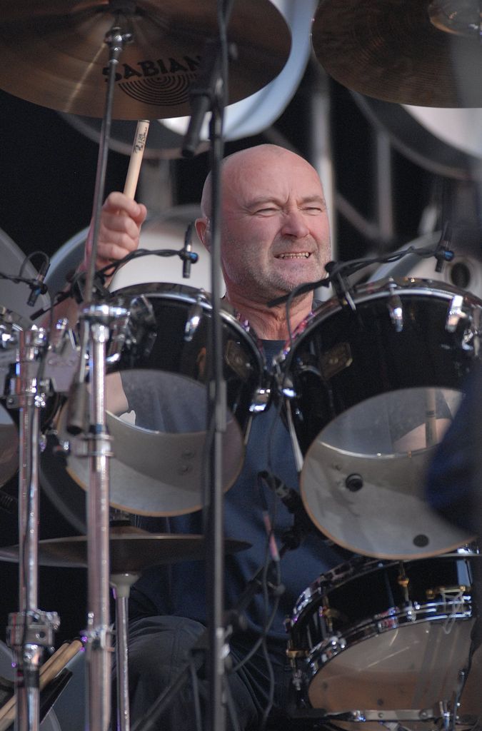  Phil Collins performing live onstage at Live Earth concert