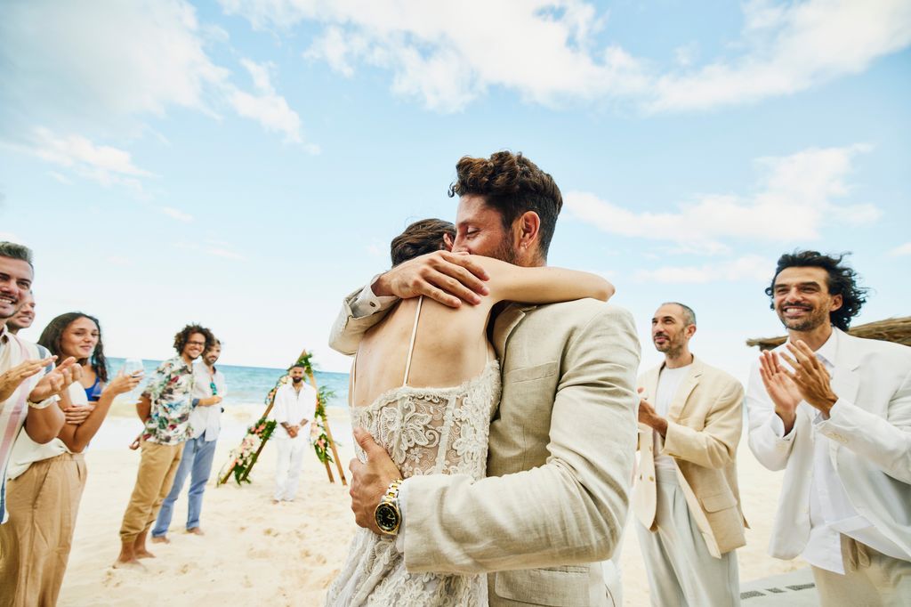 Man and woman getting married on a beach