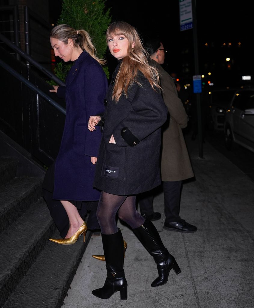 Este Haim and Taylor Swift are seen in New York