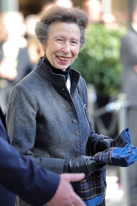 Princess Anne smiling in a smart coat