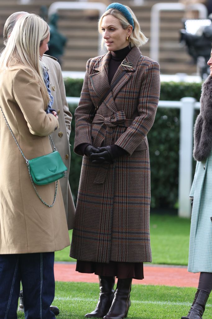 Zara Tindall talking to lady in checked coat