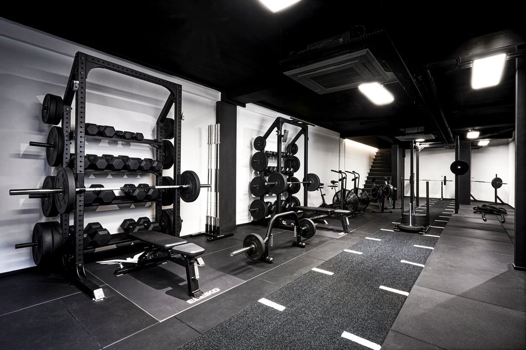 black and white photo inside a gym