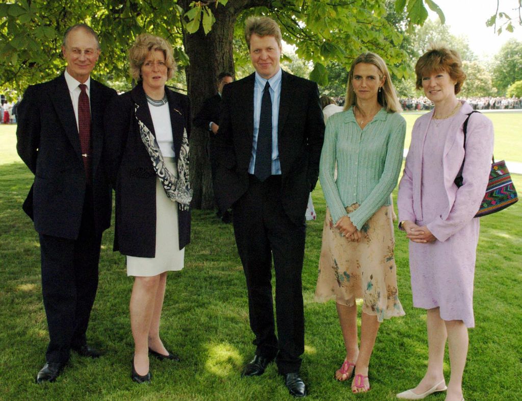 Earl Spencer with Sir William Fellowes, Lady Jane Fellowes, Lady Spencer and Lady Sarah Macorquadale after the unveiling ceremony for the Princess Diana memorial fountain in London's Hyde Park 