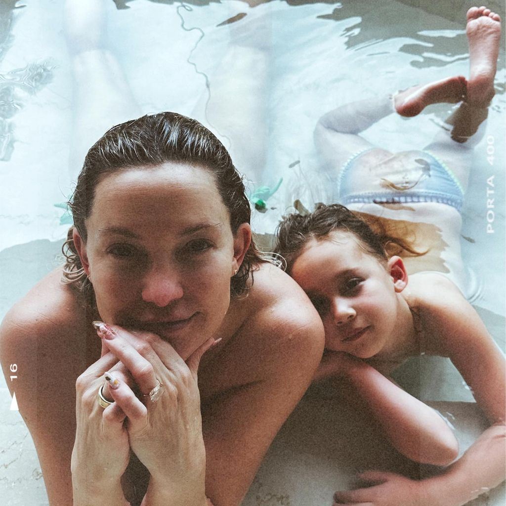 Kate Hudson and her daughter in a swimming pool