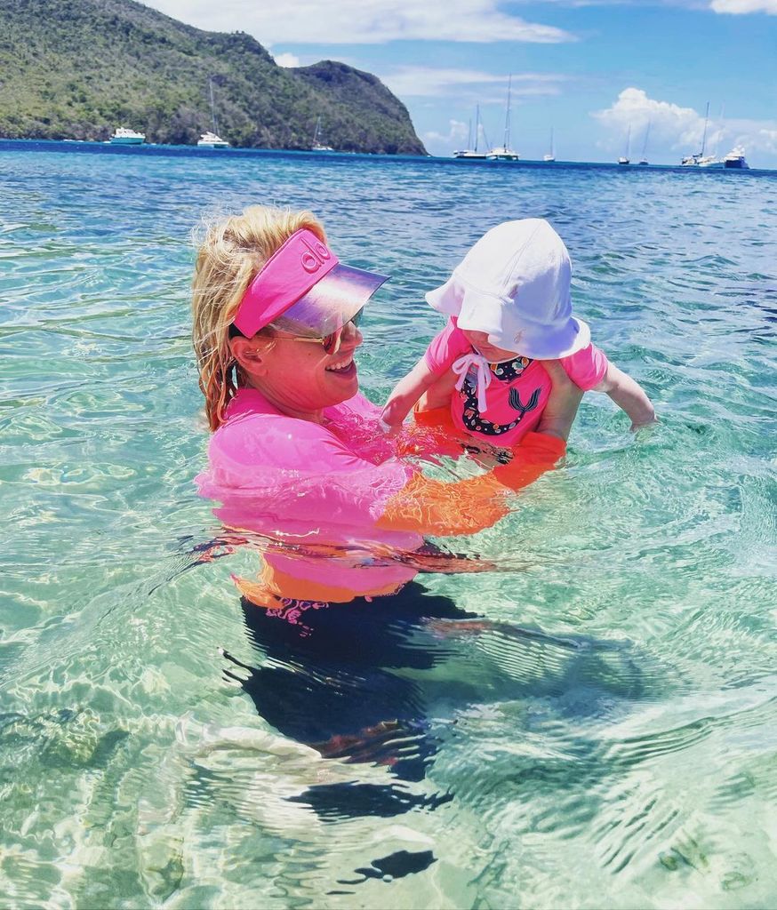 Rebel takes her daughter for her first swim