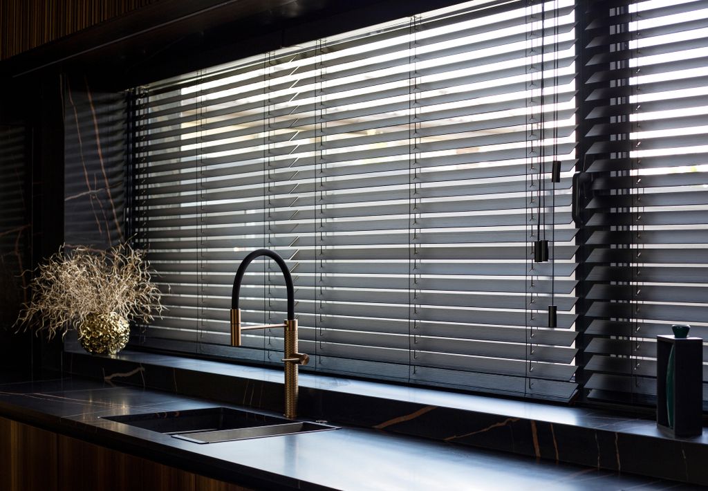 Blinds hanging at a kitchen window