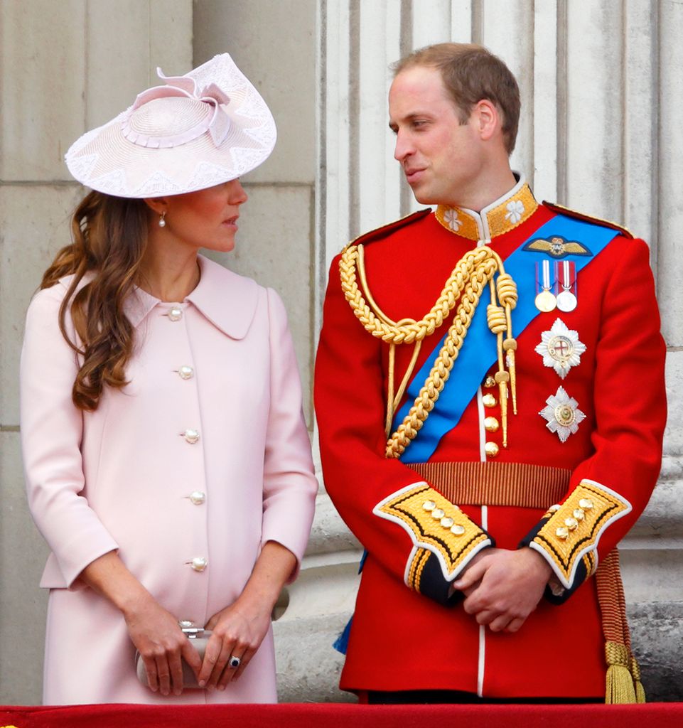 Catherine, Duchess of Cambridge and Prince William, Duke of Cambridge stand on the balcony of Buckingham Palace during the annual Trooping the Colour Ceremony on June 15, 2013 in London, England. 