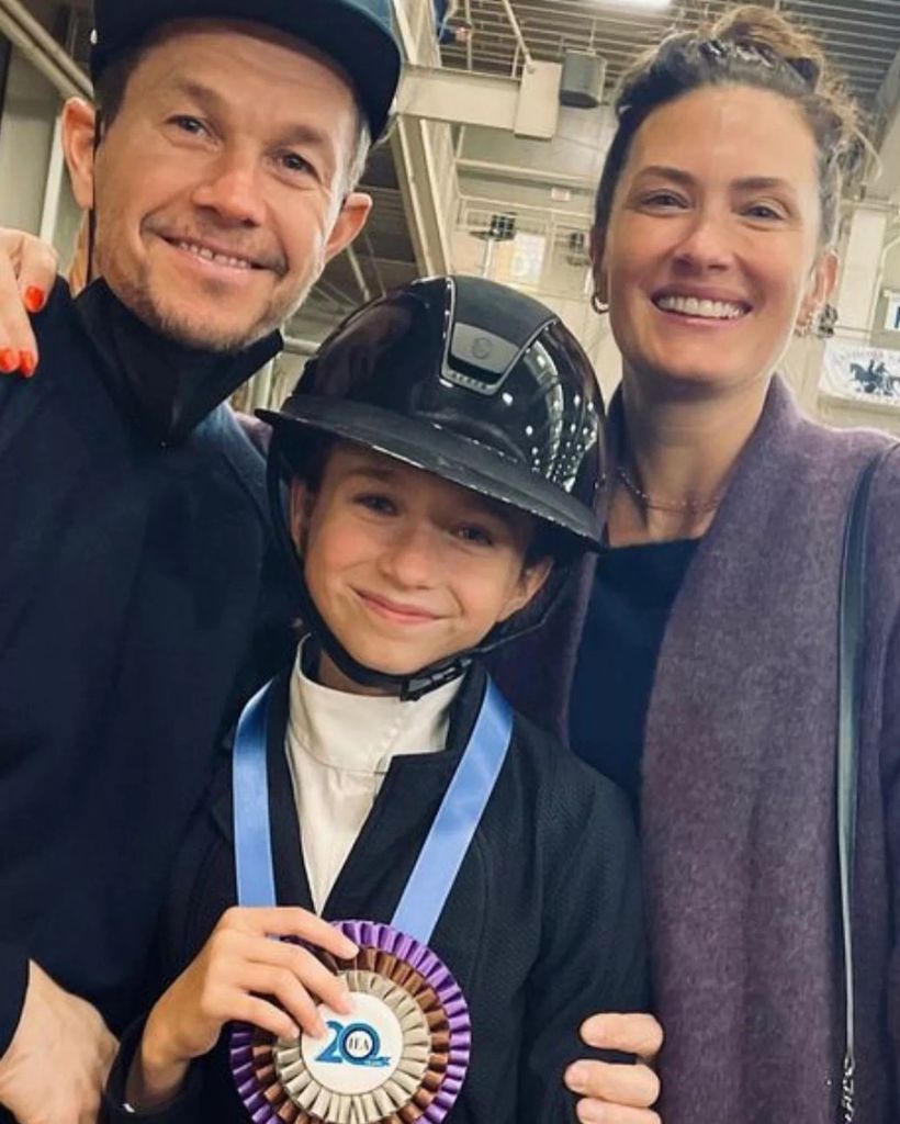 Mark and wife Rhea with their daughter Grace