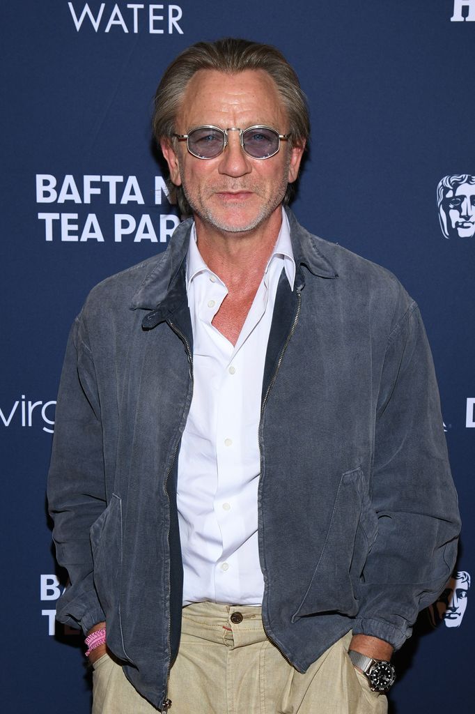 daniel craig at bafta tea party event in white shirt and blue jacket