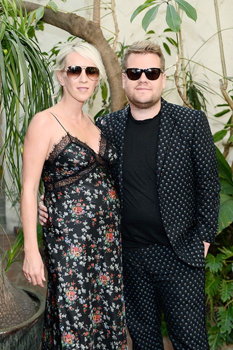julia carey shows off baby bump at vogue event with james corden