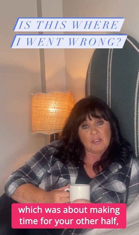 Coleen Nolan lying in bed in a flannel shirt