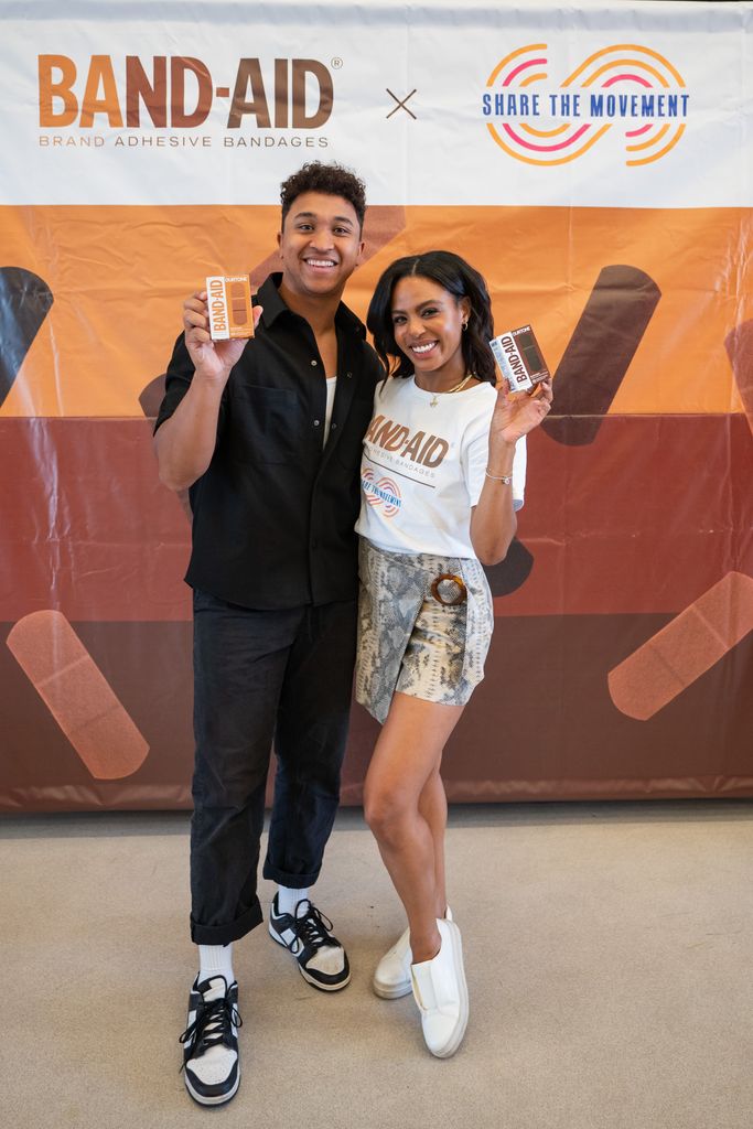 Dancing with the Stars pros Britt Stewart and Brandon Armstrong at a Share the Movement x BAND-AID Brand Dance Clinic