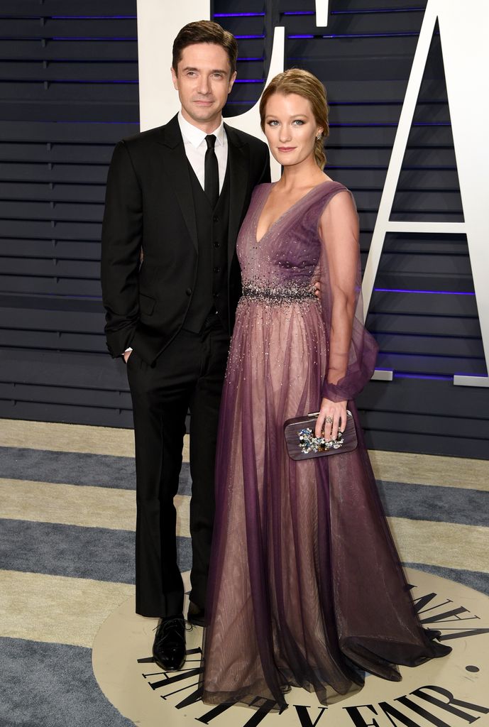 Topher Grace and Ashley Hinshaw at 2019 Vanity Fair Oscars party