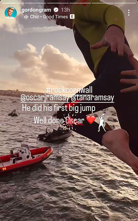 young boy jumping into sea