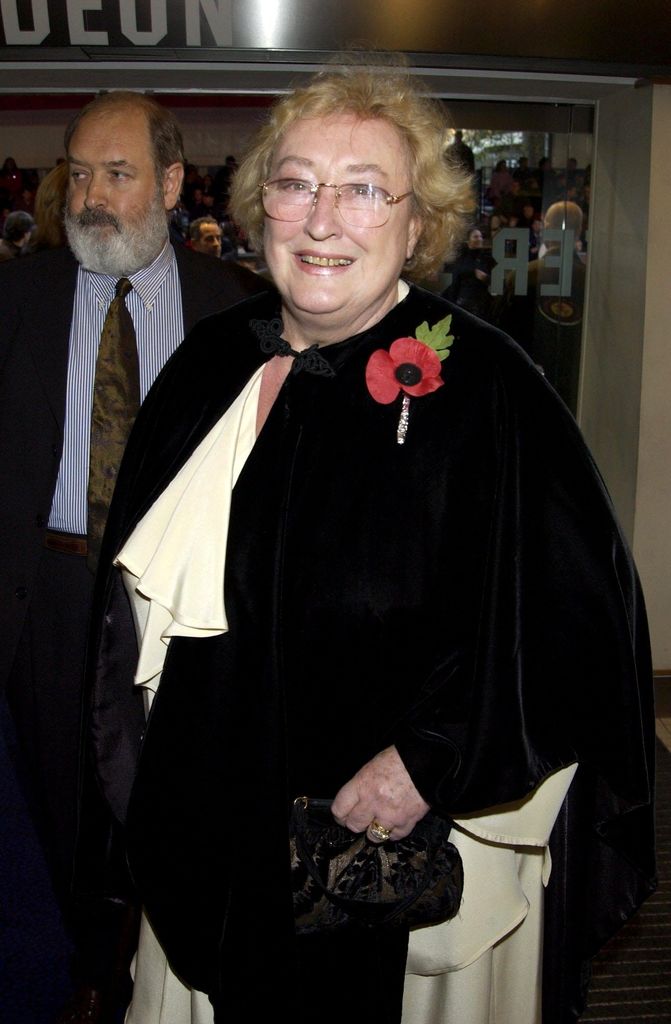 Elizabeth Spriggs in a black outfit