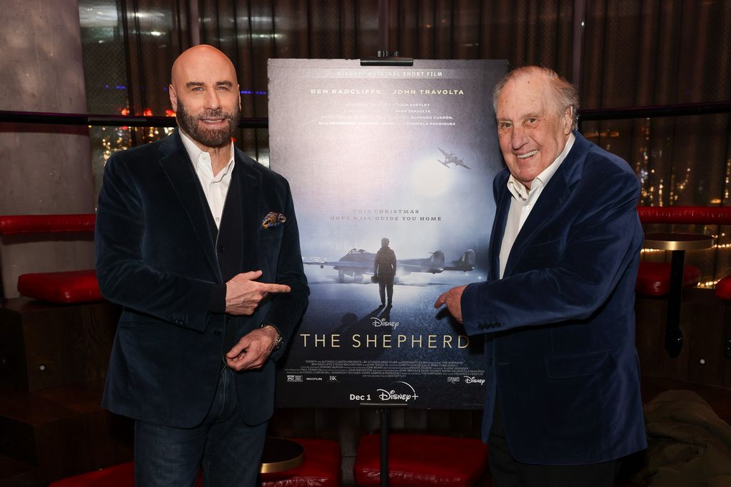 John Travolta and Frederick Forsyth attend a screening of Disney + Original Short Film "The Shepherd" at W London on November 23, 2023 in London, England.