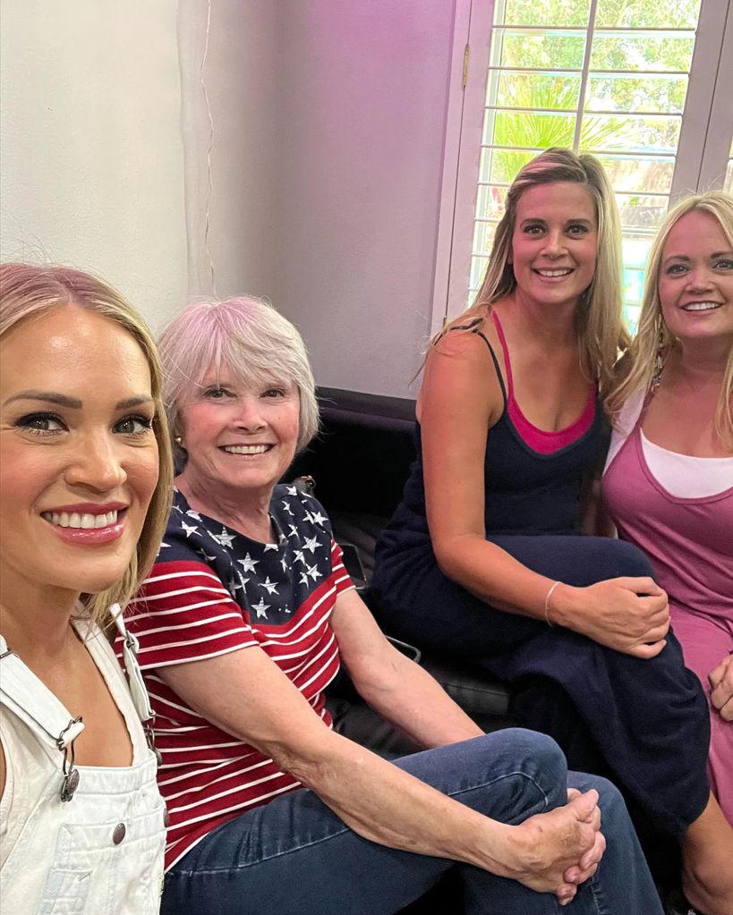 Carrie with her mom and sisters
