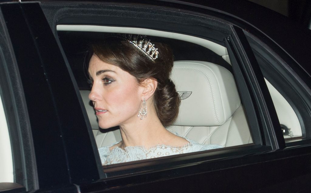 Kate in car in lace dress and tiara