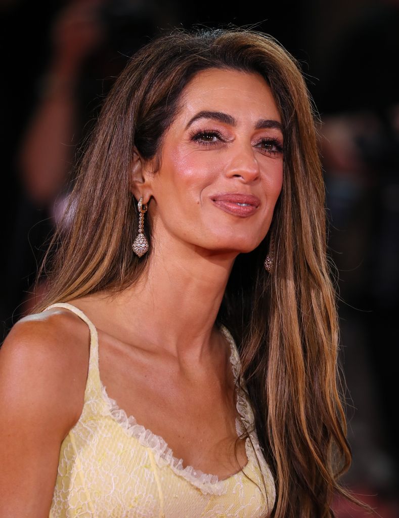 #Amal Clooney attends the "Wolfs" red carpet during the 81st Venice International Film Festival on September 01, 2024 in Venice, Italy