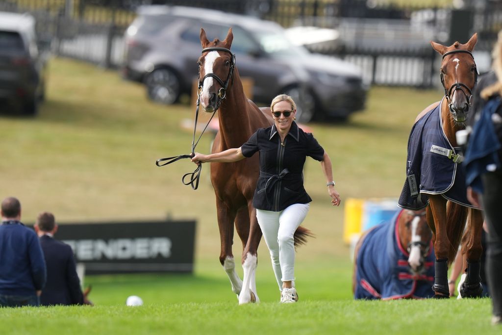 Zara had to sprint up the hill with her horse before the first inspection