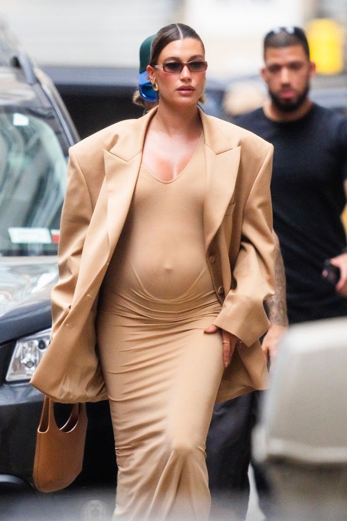 The Rhode Skin founder showed off her blooming baby bump in a sleek bodycon dress