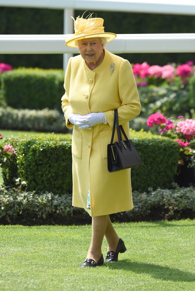 As far as the Queen was concerned, no outfit was complete without her signature purse