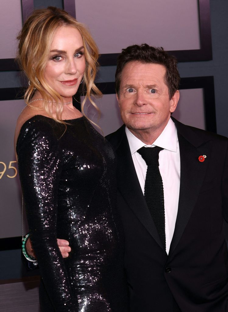 Michael J. Fox and his wife US actress Tracy Pollan arrive for the Academy of Motion Picture Arts and Sciences' 13th Annual Governors Awards. She is wearing a black sequin dress. 