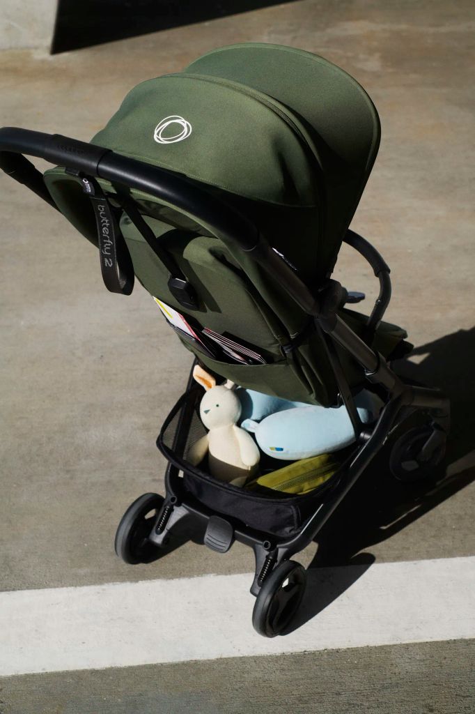 Back of forest green pram