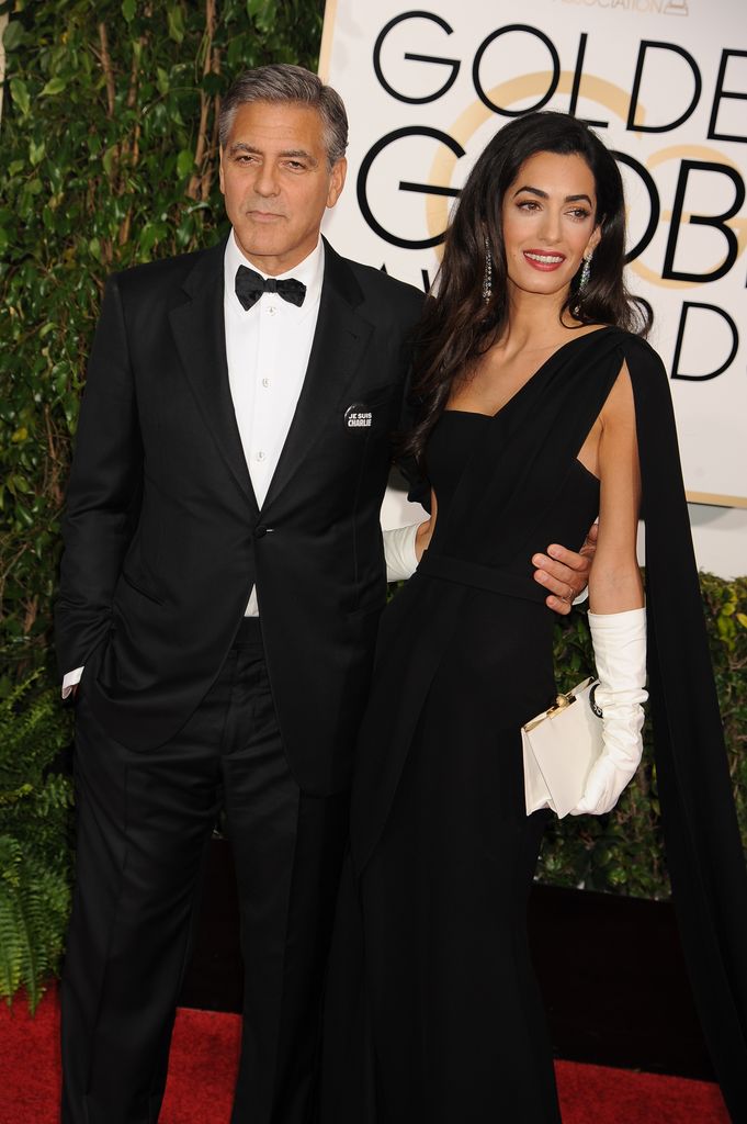 Actor George Clooney and wife, Amal Alamuddin arrive at the 72nd Annual Golden Globe Awards held at the beverly Hilton Hotel.