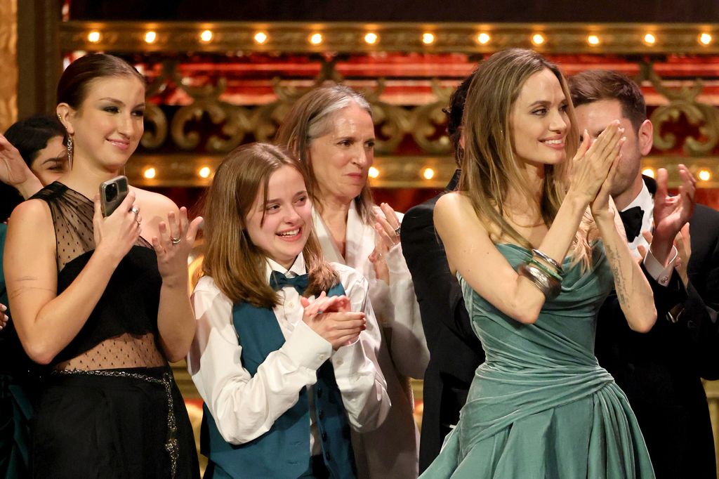 Angelina and Vivienne on stage accepting Best Musical for The Outsiders at The Tonys 
