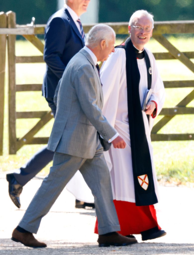 Charles greeted Reverend Canon Paul Williams with a warm smile