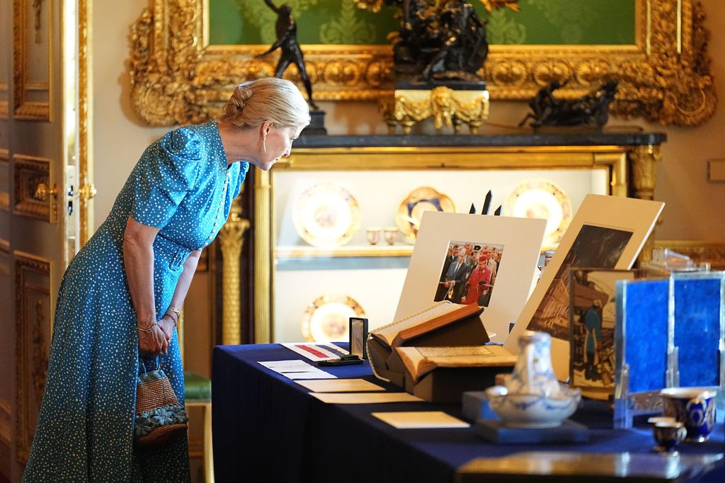 Duchess Sophie views items on display during a visit by President of France Emmanuel Macron and his wife Brigitte Macron to view the Royal Collection exhibition, in the Green Drawing Room at Windsor Castle, Berkshire, on day one of the French President's state visit to the UK.