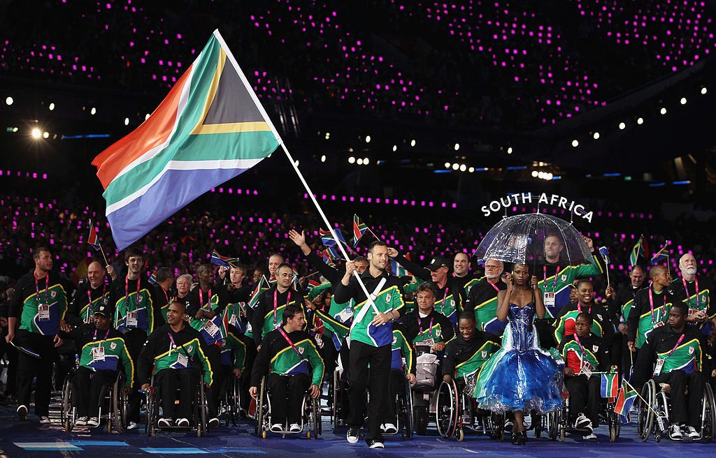 LONDON, ENGLAND - AUGUST 29:  Athlete Oscar Pistorius of South Africa carries the flag during the Opening Ceremony of the London 2012 Paralympics at the Olympic Stadium on August 29, 2012 in London, England.  (Photo by Dan Kitwood/Getty Images)