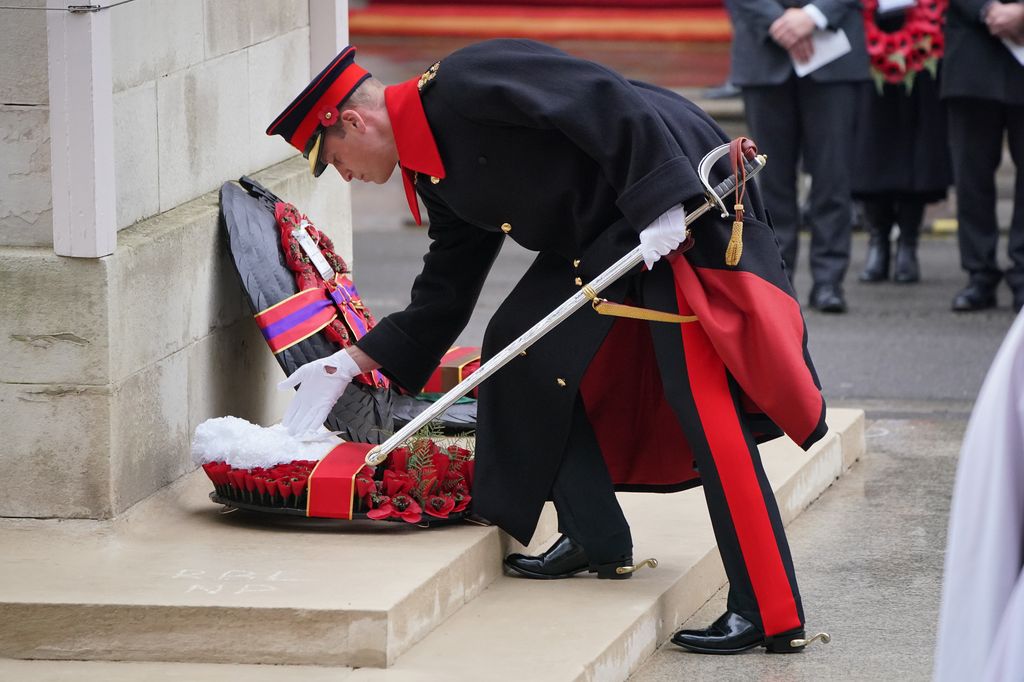 The Prince of Wales lays a wreath during the Remembrance Sunday service at the Cenotaph