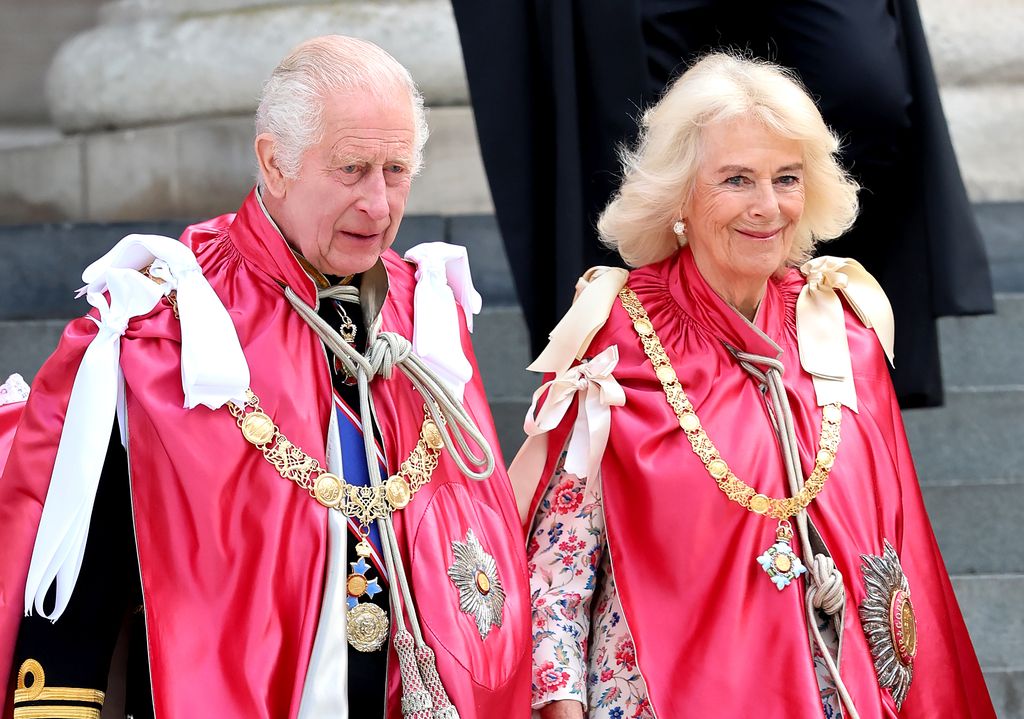  King Charles III and Queen Camilla walk down the steps of St Paul's Cathedral