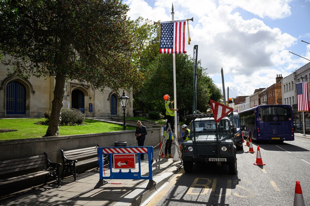  A US banner is installed by engineers fro The Flag Consultancy in the street outside Windsor Castle on September 12, 2025 in Windsor, England