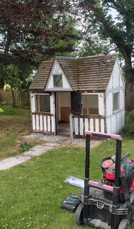  rotten Wendy house in garden
