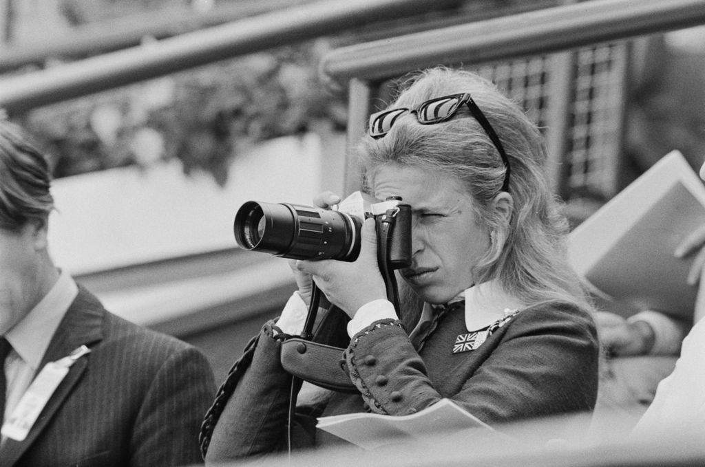 Princess Anne taking a photograph at the 1972 Summer Olympics in Munich, West Germany