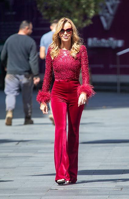 amanda holden feathered jumpsuit red